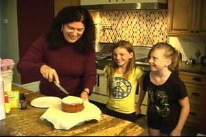 Lisa baking 9 cutting cake for kids